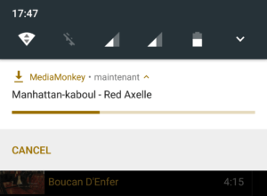 Capture d'écran de l'application MediaMonkey Android, affichage de la notification de téléchargement en cours.